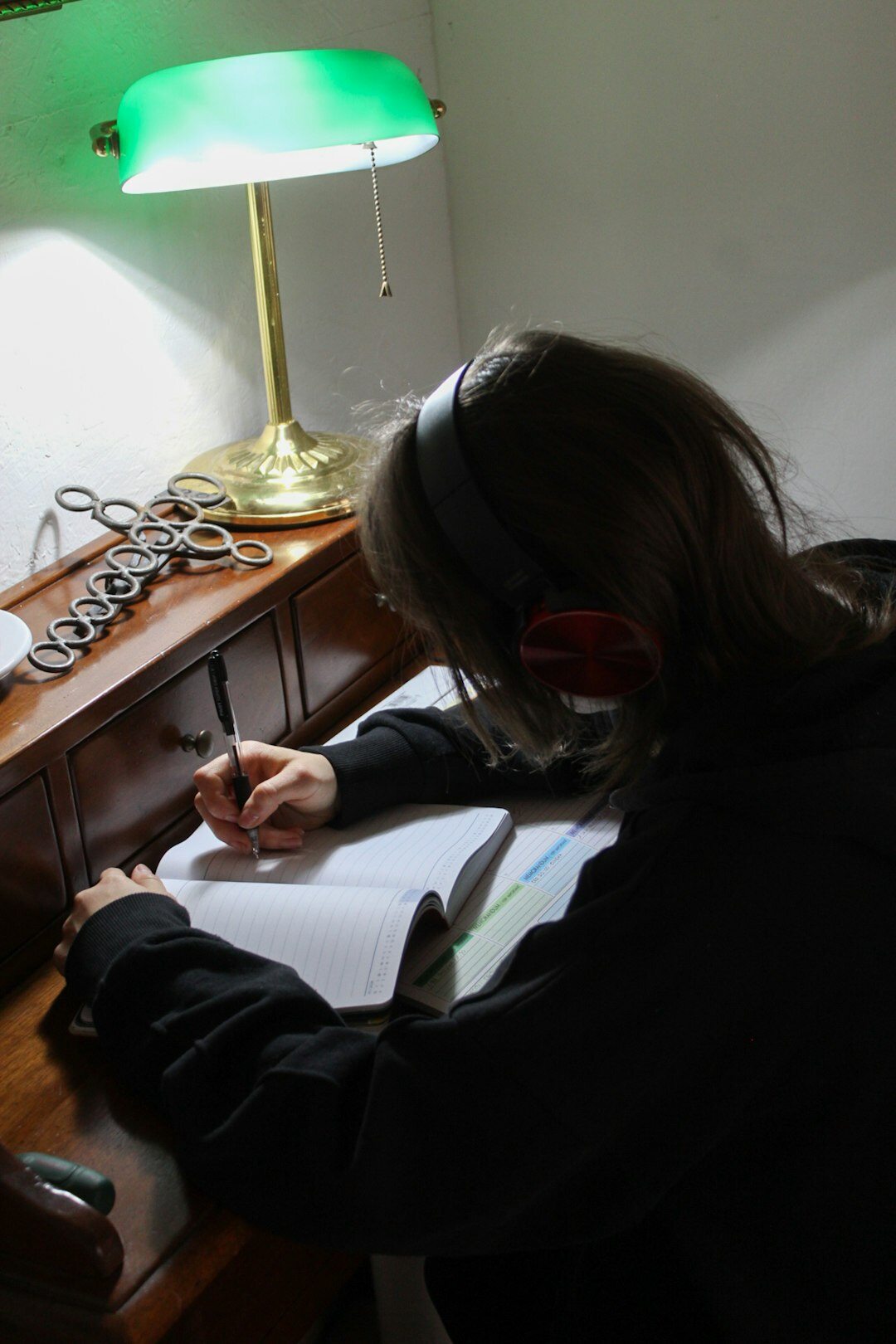 writer at desk with notebook